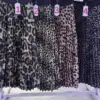 Jupe plissée effet cuir motif jaguar